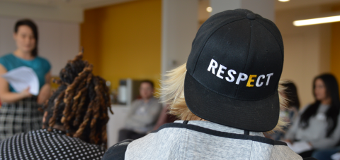 A student wearing a GLSEN hat